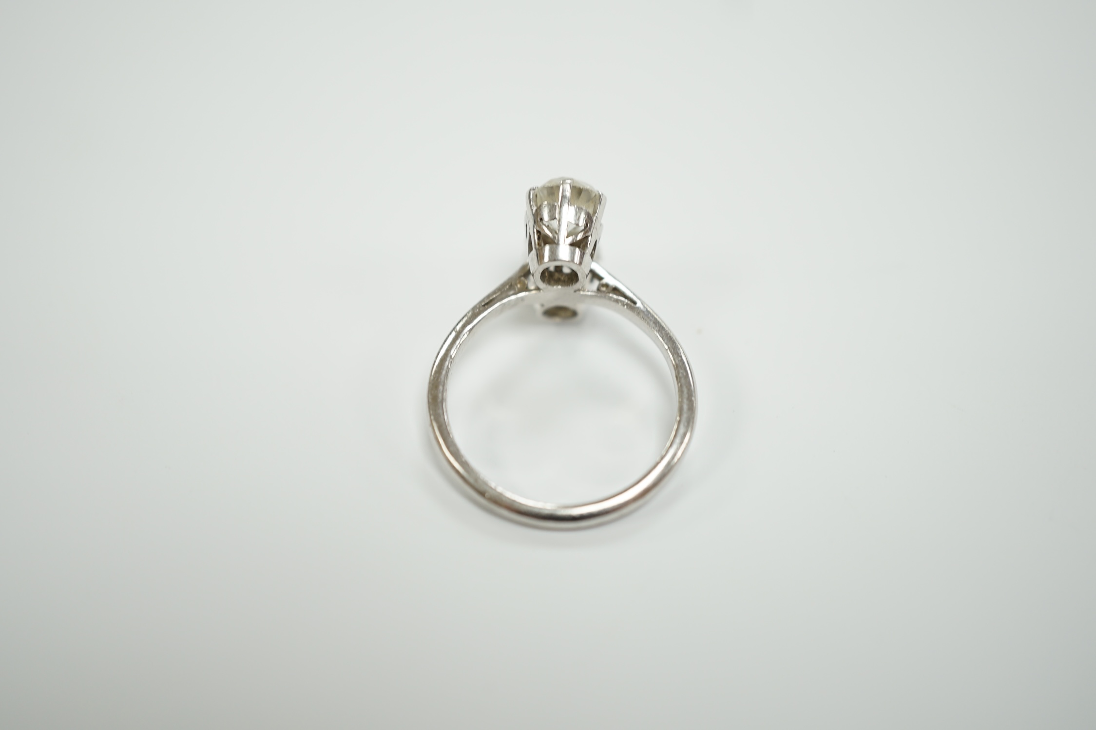 A mid 20th century white metal (stamped plat) and two stone white zircon? set ring, size M, gross weight 4.9 grams.